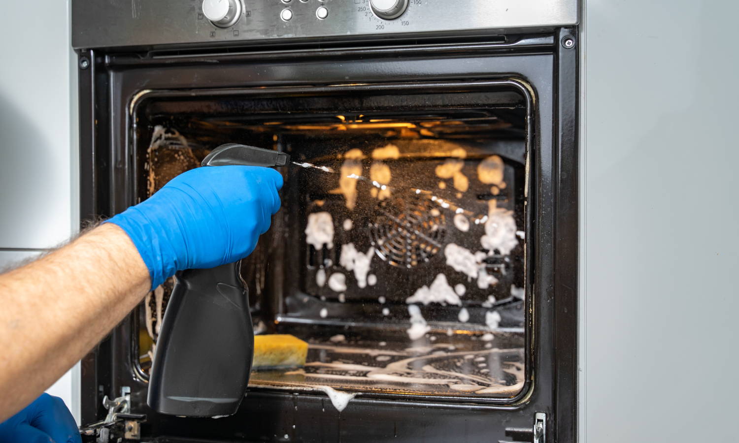 Deep cleaning kitchen oven